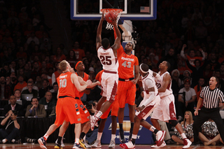 James Southerland tries to block Quenton DeCosey's shot. Southerland finished the game with zero blocks.