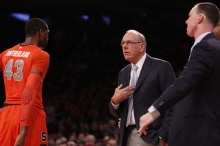 Jim Boeheim speaks with Southerland during a pause in play Saturday afternoon.