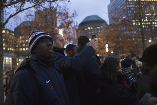 Syracuse running back Jerome Smith (left) observes the 9/11 Memorial Thursday.