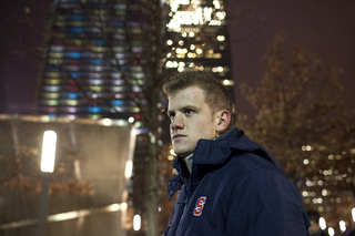 Syracuse quarterback Ryan Nassib stands outside at the 9/11 Memorial Thursday.