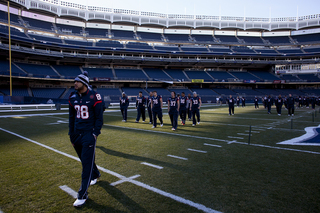 Wide receiver Jarrod West walks across the field at Yankee Stadium, a day before the Orange are scheduled to play West Virginia.