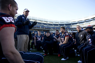 Head coach Doug Marrone speaks to the Syracuse football team and area youths attending a 