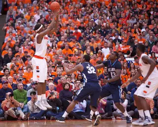 Syracuse forward CJ Fair (5) connects on one of his seven field goals. Fair finished the game with 22 points. 