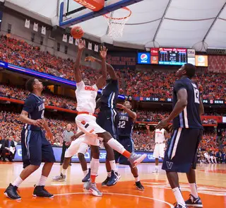 Syracuse's Jerami Grant (3) is fouled as he attempts a layup in traffic late in the second half. 