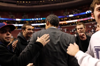 Villanova head coach Jay Wright is congratulated by fans after the game.