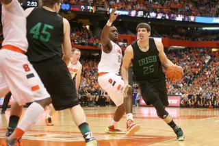 Tom Knight drives the lane in Notre Dame's loss to Syracuse Monday evening in the Carrier Dome. He shot 1-of-8 from the field in 24 minutes of play.