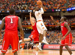 Syracuse forward James Southerland attempts a floater in his first game back from suspension.