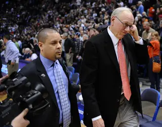 Syracuse head coach Jim Boeheim walks off the field after Syracuse's 66-58 loss to Connecticut.