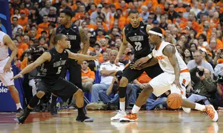 C.J. Fair dribbles on the perimeter in SU's loss to the Hoyas in the final meeting as Big East rivals at the Carrier Dome. Fair scored 13 points and snagged seven rebounds in the loss.