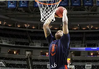 DaJuan Coleman dunks the ball during practice on the day prior to the start of the second round of the 2013 NCAA men's basketball tournament.