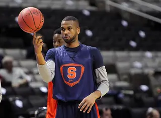 James Southerland spins the ball on his finger during practice.