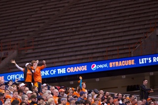 Members of the 23,380-person crowd in attendance cheer during a break in the action Wednesday night in the Carrier Dome.