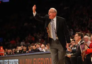 Head coach Jim Boeheim directs his team from the sidelines. Wednesday's game was his 76th in the Big East tournament. His 47 wins are more than any other coach in conference history.