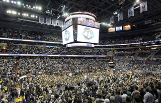 A general view of the court as fans of the Georgetown Hoyas storm the court after the win over Syracuse.