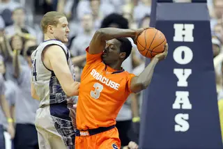 Jerami Grant attempts to create space against Nate Lubick.