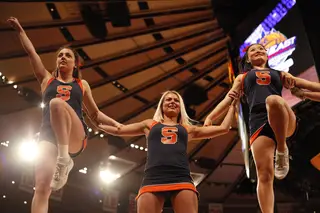 Syracuse cheerleaders pump up the pro-SU crowd before the Orange took on Seton Hall in Madison Square Garden Wednesday.