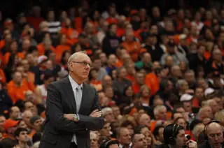 Jim Boeheim stares out onto the court bearing his name in the first half.