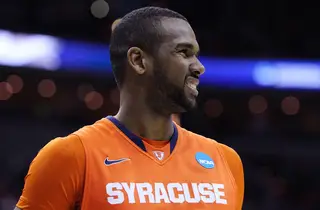 James Southerland #43 of the Syracuse Orange drives smiles as he looks on after a play against the Indiana Hoosiers.
