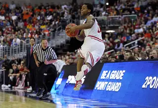 Kevin (Yogi) Ferrell #11 of the Indiana Hoosiers jumps to keep the ball in bounds.