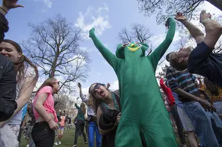 Chloe Rodabaugh, a junior musical theater major, dances with Connor Deroin, a sophomore political science major dressed in a Gumby costume