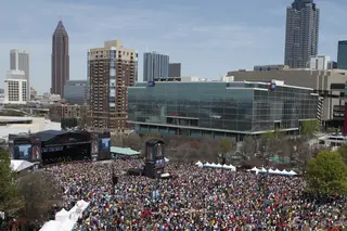 Thousands gather to Centennial Park in Atlanta, Ga., to celebrate the NCAA Final Four match ups and listen to live performers such as Macklemore and Ryan Lewis.