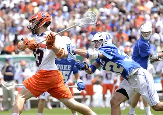 Luke Cometti fires in a shot in the NCAA championship game.