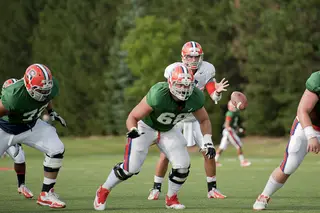 Drew Allen takes a snap during Syracuse training camp.