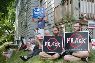 Protesters gather on a local lawn in an attempt to raise awareness about hydrofracking.