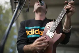 Mike Kamerman of Smallpools shows off his guitar playing skills.