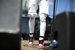 Jesse Rutherford dances around the stage in his Air Jordans.