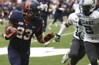 Syracuse running back Prince-Tyson Gulley sizes up a defender.