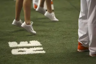 Former Syracuse Athletics chief financial officer and associate director of athletics Rob Edson's initials are marked on the turf in the Carrier Dome.