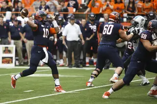 Terrel Hunt winds up for a pass. The Syracuse quarterback completed 16-of-21 passes against Tulane.