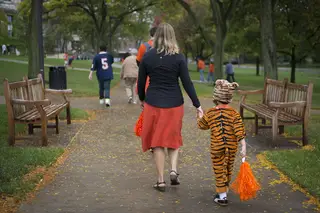 A young Clemson fan and his mother make their way to the Carrier Dome.