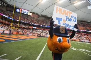 Otto the Orange displays a sign from the crowd prior to kickoff.
