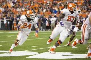 Clemson running back Zach Brooks rounds the corner on a rushing attempt.