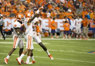Tigers cornerback Darius Robinson celebrates a stop with members of the Clemson secondary.