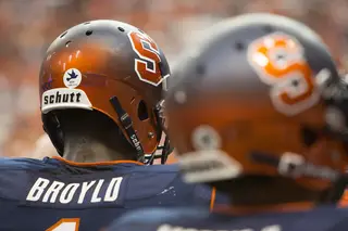A Remembrance Week sticker is seen on the back of Orange H-back Ashton Broyld's helmet.