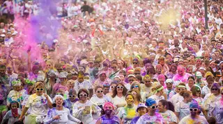 Oct. 5, 2013: Thousands of people ran in the Run or Dye 5k on Saturday morning. During the event, volunteers threw powder dye at runners as they passed through designated checkpoints. Afterward, runners threw their own dye into the sky. 