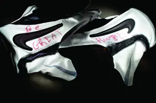 Oct. 9, 2013: Thin red letters are written across the back of Jay Bromley’s gray and white practice gloves. The gloves serve as a reminder to Bromley about where he came from and who got him there.