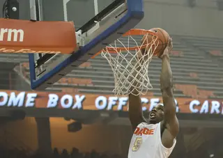 C.J. Fair elevates to dunk during SU's scrimmage during Orange Madness.