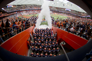 Syracuse prepares to charge out of the tunnel before its game against Wake Forest in the Carrier Dome.