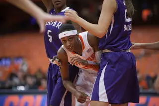 Brittney Sykes boxes out Niagara's defense during a free throw.  