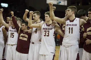 Boston College stands arm-in-arm and faces its crowd after a tough loss to a stingy Syracuse team. 