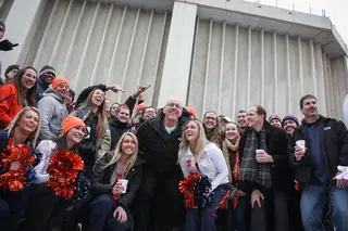 Jan. 31: Jim Boeheim poses with SU cheerleaders, campers and fans outside of the Carrier Dome. Boeheim stopped by the Carrier Dome to visit students and members of Otto's Army who were camping out before SU's game against Duke.