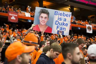 Signs dotted the Carrier Dome crowd, this one of Justin Bieber as a Dukef an. 