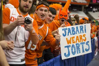 SU fan Johnny Oliver displays a sign about star Duke freshman Jabari Parker. 