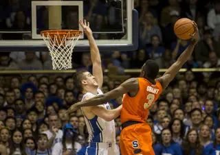 Jerami Grant rises up for a missed dunk over Marshall Plumlee. 