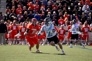 Rob Guida looks to blow by a Syracuse defender. 