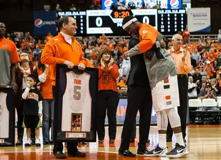Senior forward C.J. Fair is honored before the game with a framed jersey as a part of the Senior Night ceremony. 